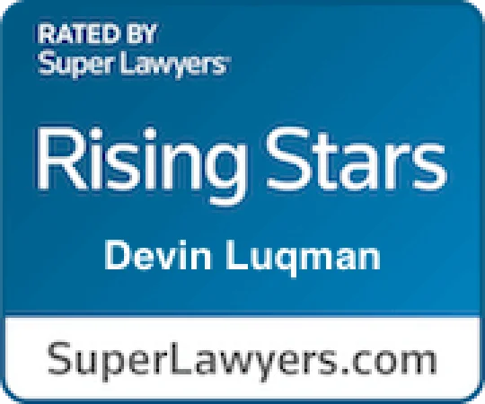 Blue badge with text "RATED BY Super Lawyers, Rising Stars, Devin Luqman, SuperLawyers.com"