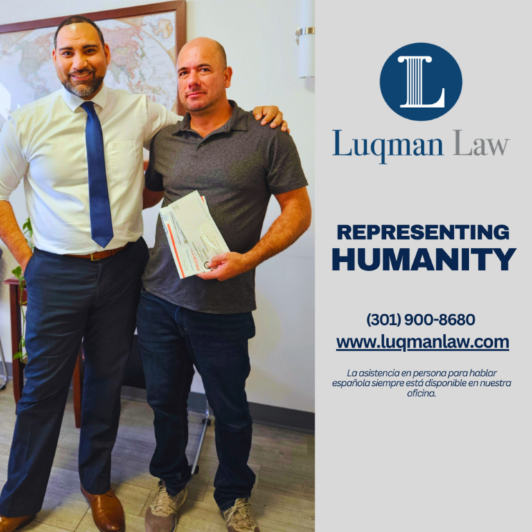 Two men standing together in an office, one in a dress shirt and tie, the other in a casual polo shirt and jeans, both smiling. The left features a logo and textual information for Luqman Law, including a slogan "REPRESENTING HUMANITY" and contact details.