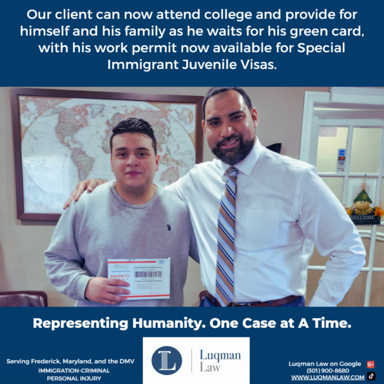 Two men smiling in an office setting, one holding a priority mail envelope, with a world map and legal firm promotional information in the background.